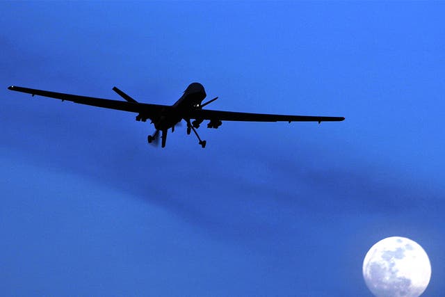 A US Predator drone flies over Kandahar Air Field, southern Afghanistan