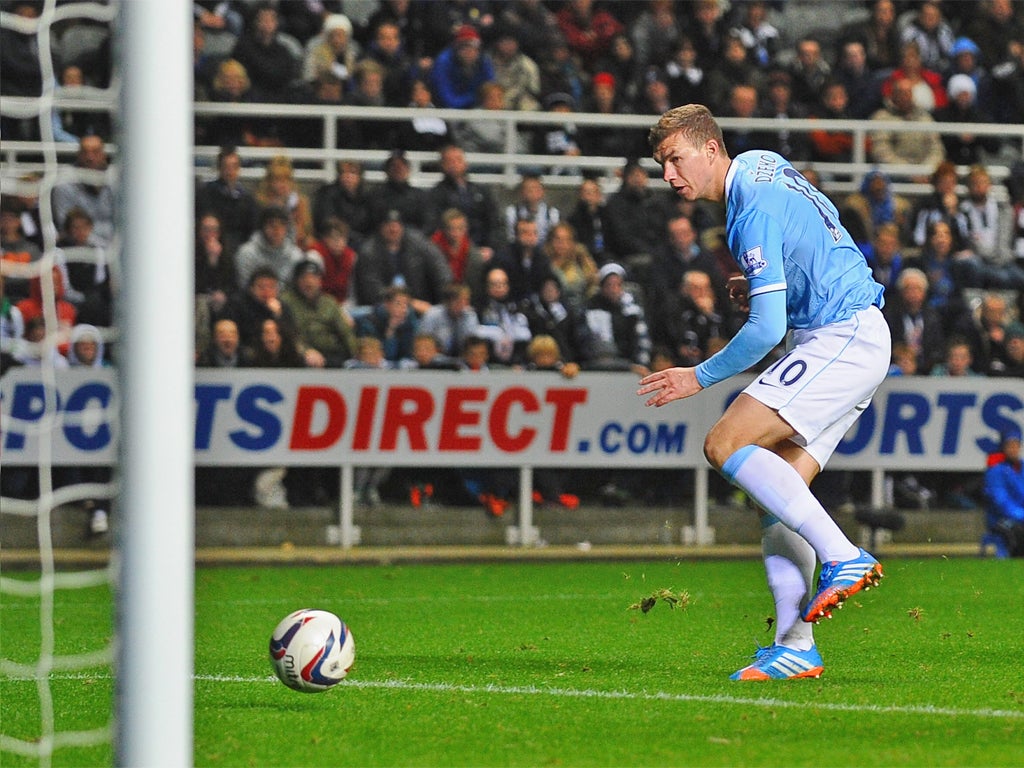 Edin Dzeko rounded goalkeeper Tim Krul to give himself an easy finish