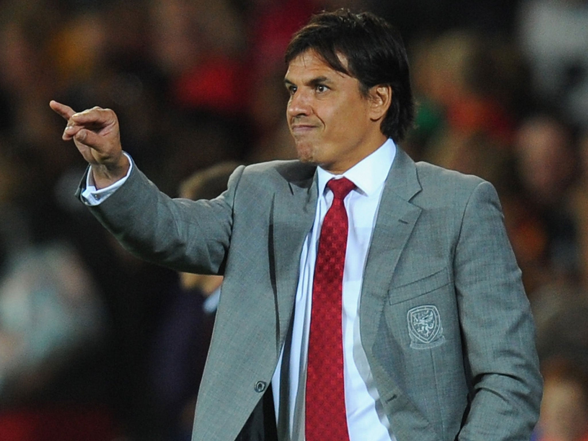 Chris Coleman makes a point on the touchline during Wales 3-0 defeat by Serbia in September