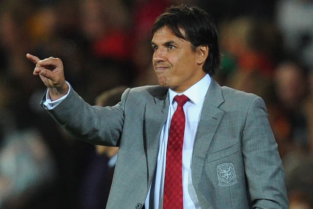 Chris Coleman makes a point on the touchline during Wales 3-0 defeat by Serbia in September