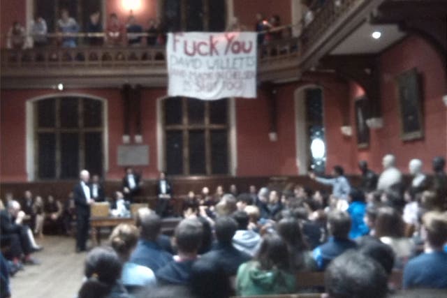 Protesters at the Oxford Union make their feelings known