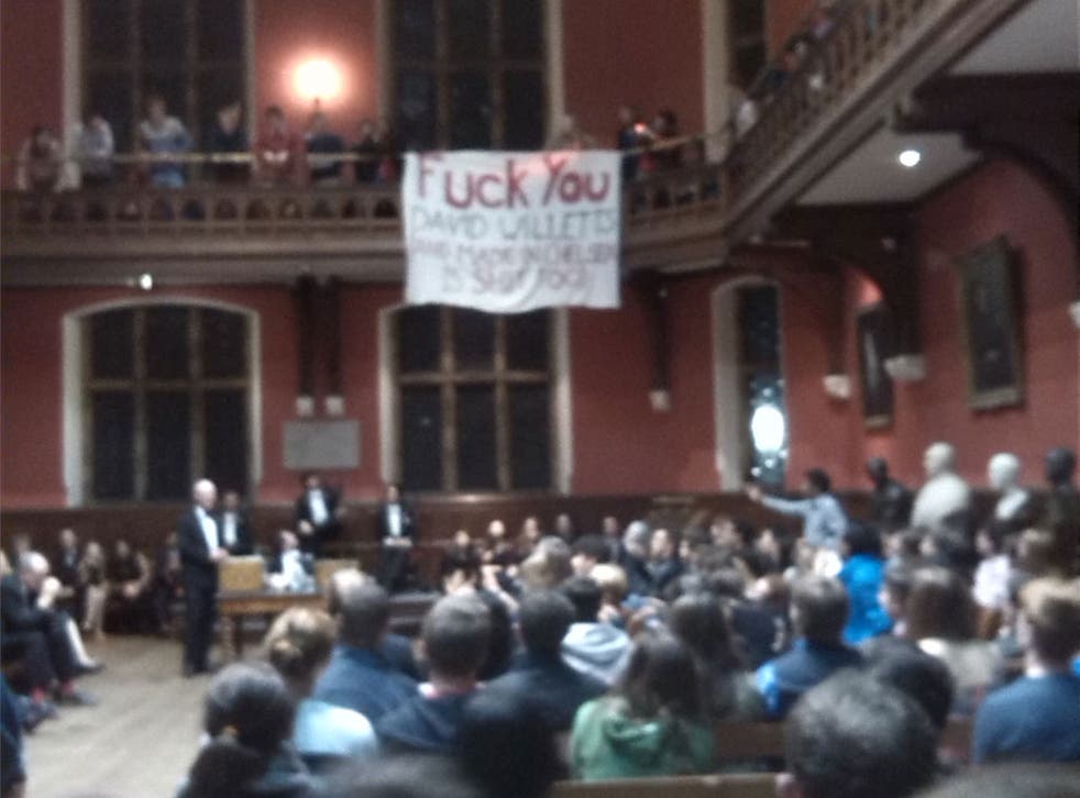 Protesters at the Oxford Union make their feelings known