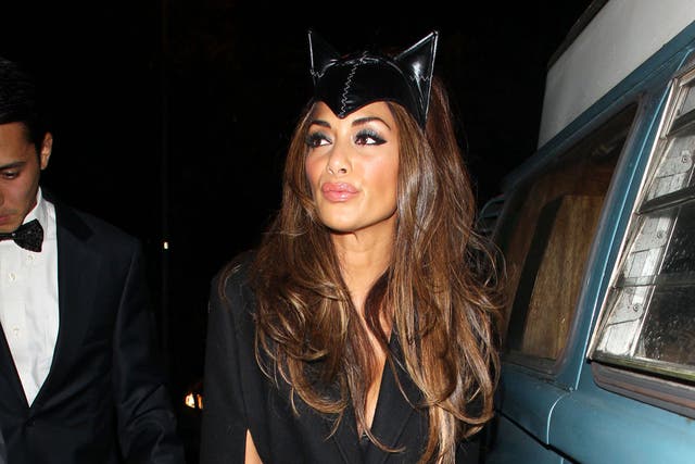 Nicole Scherzinger arrives at Jonathan Ross's Halloween bash dressed as Catwoman