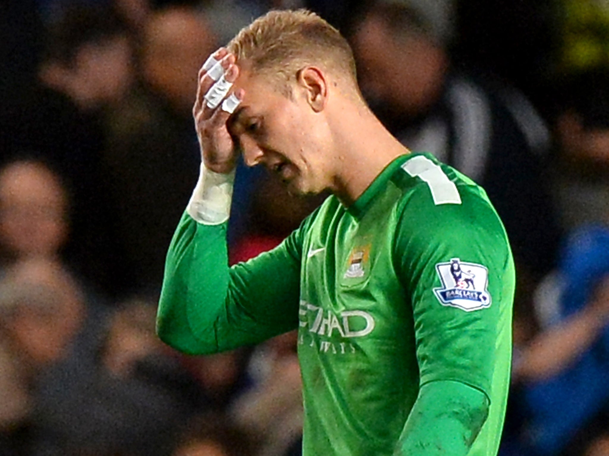 Joe Hart holds his head in his hands after Fernando Torres' late winner gave Chelsea a 2-1 win over Manchester City