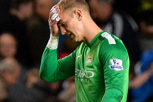 Joe Hart holds his head in his hands after Fernando Torres' late winner gave Chelsea a 2-1 win over Manchester City