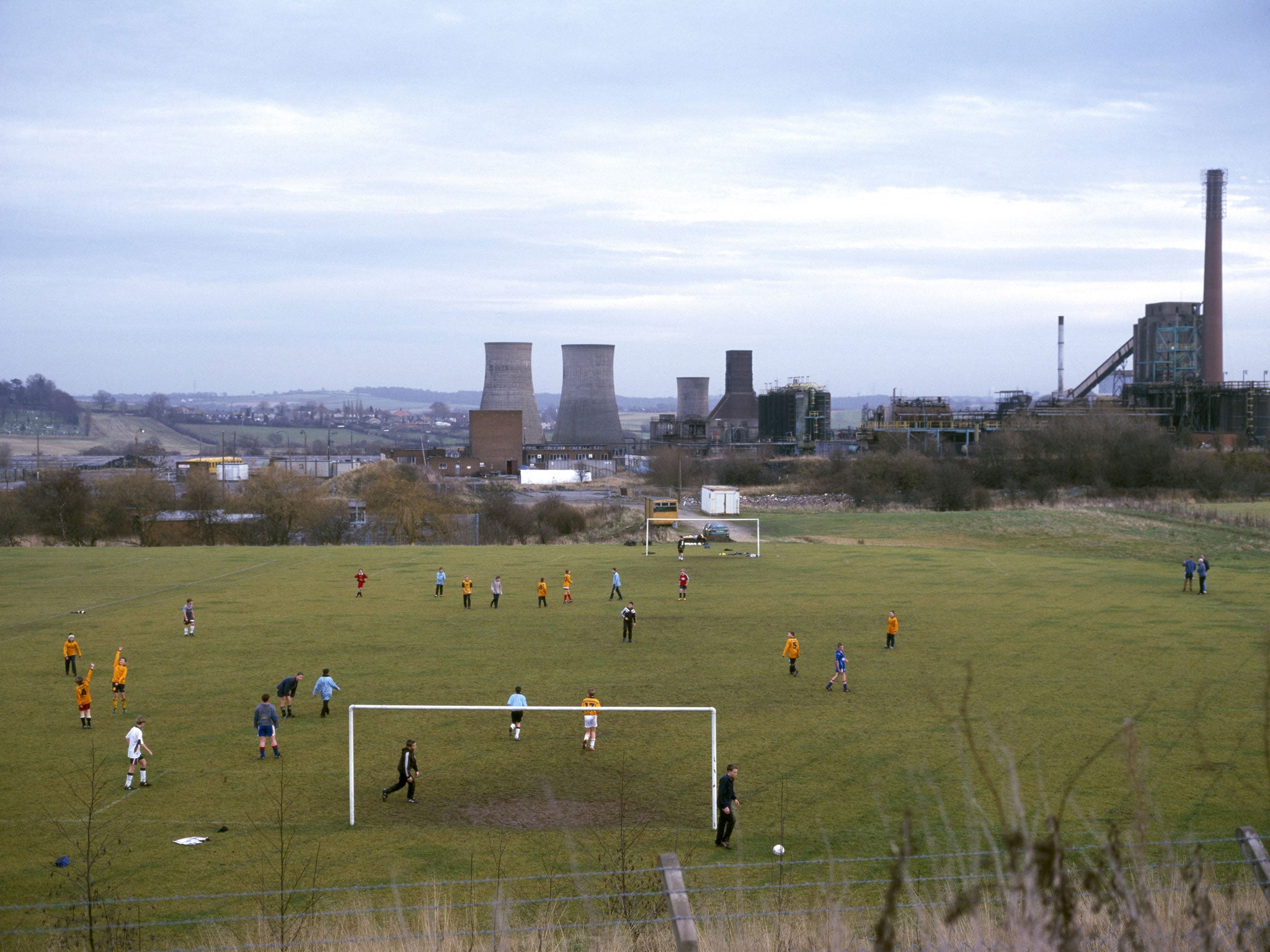 'Two lads somewhere': This scene in North Derbyshire, not far from the FA's £105m St George's Park development, appears in photographer Stuart Roy Clarke's 'Homes of Football: Where The Heart Is' (Bluecoat Press, £19.99), which is published this week