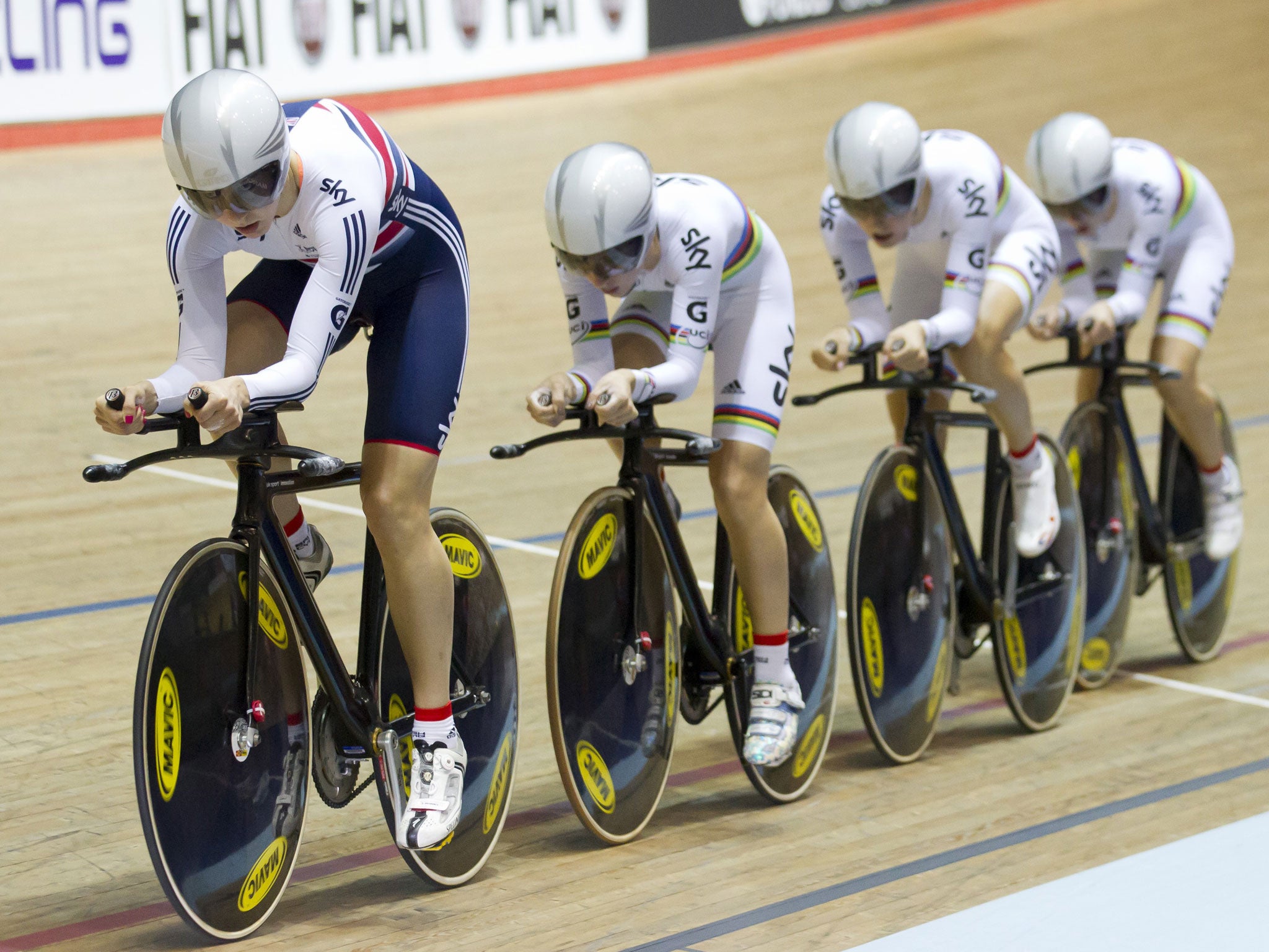 Jo Rowsell, left, leads Great Britain team-mates Laura Trott, Elinor Barker and Dani King to gold in the Women's Team Pursuit in Manchester last night