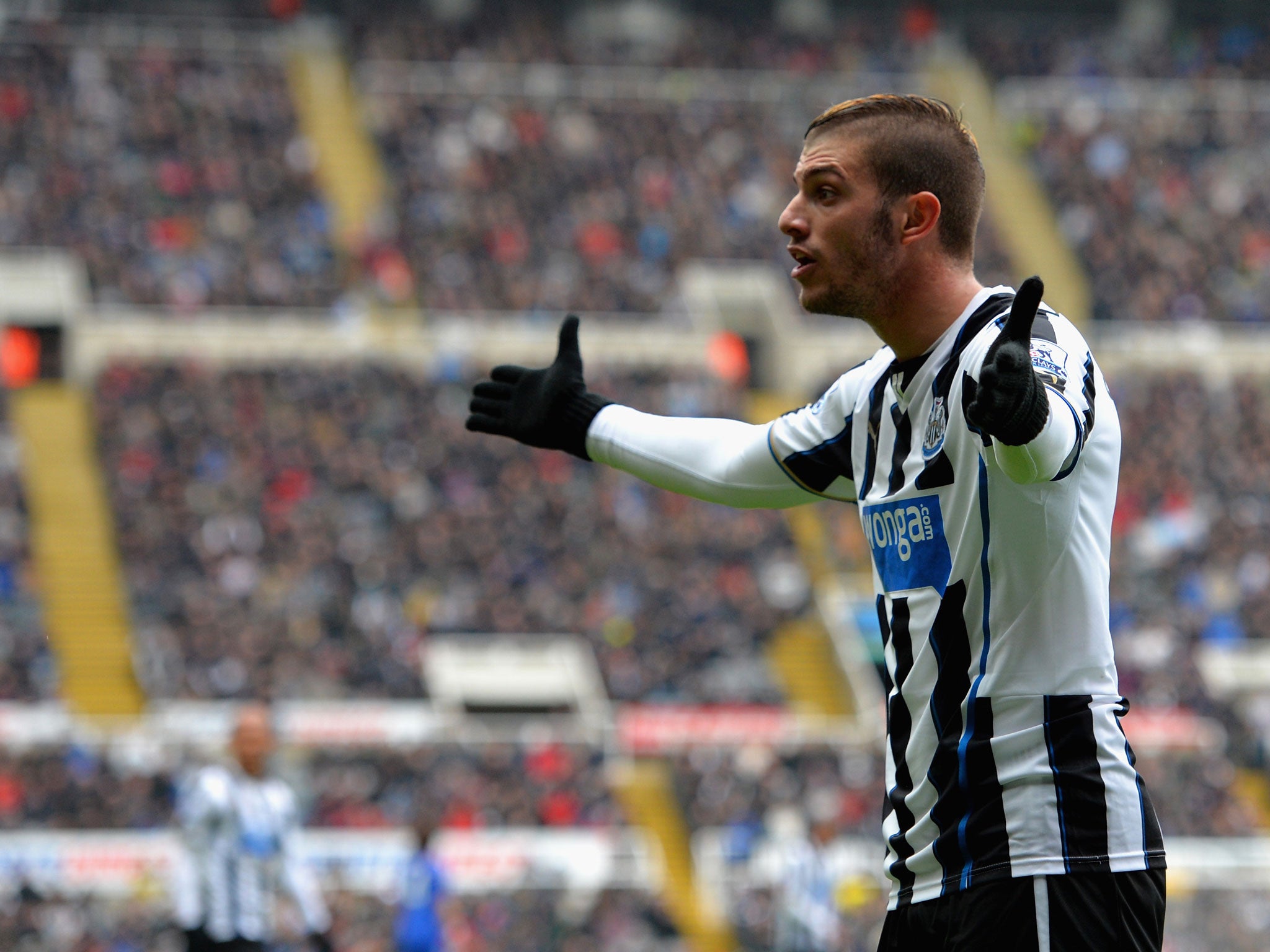 Davide Santon appeals to the referee