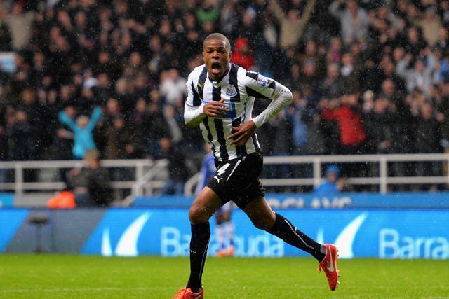 Loic Remy celebrates after he scures Newcastle's 2-0 victory over Chelsea