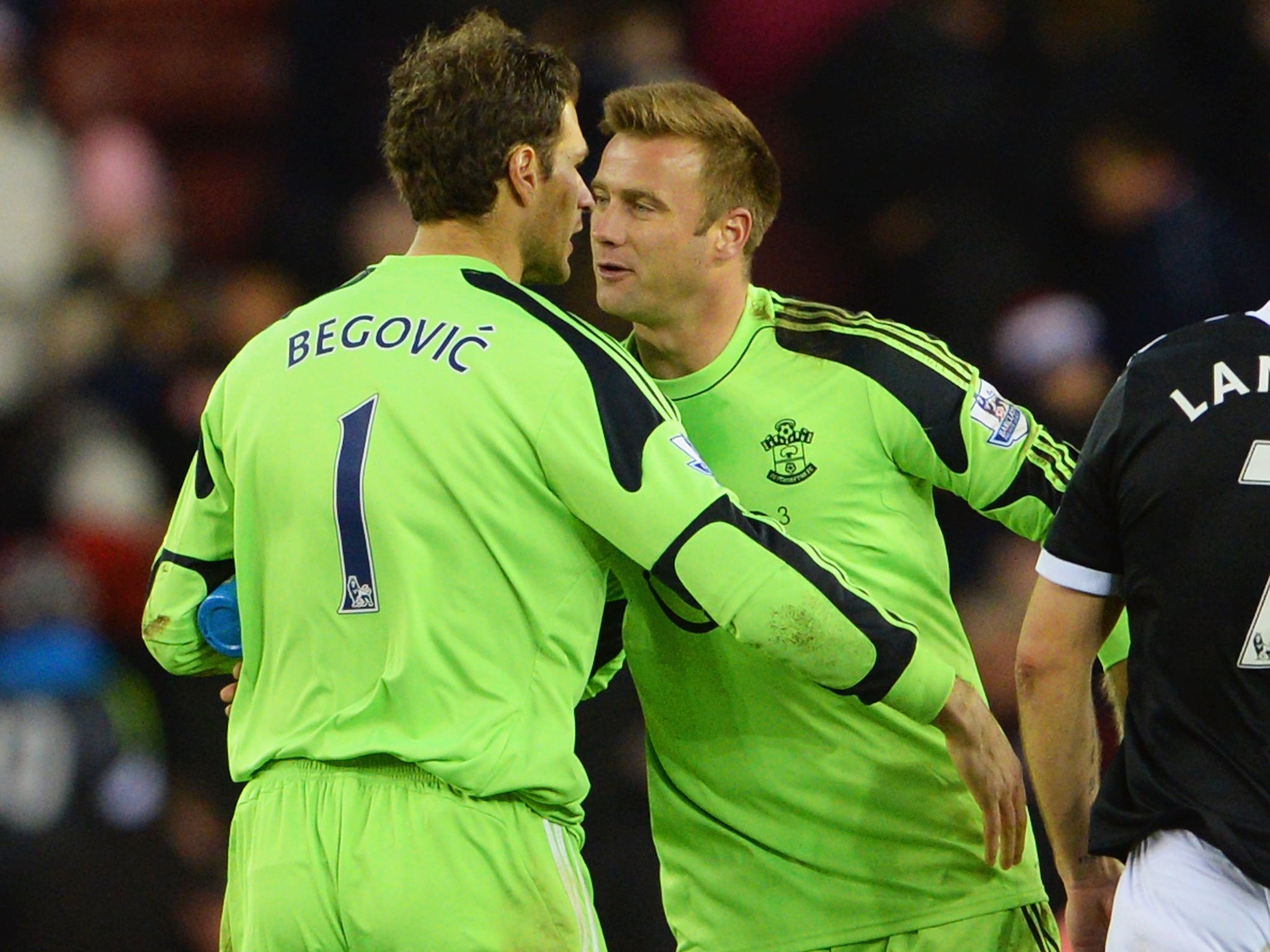 Artur Boruc congratulates Asmir Begovic after he scored from 100-yards out