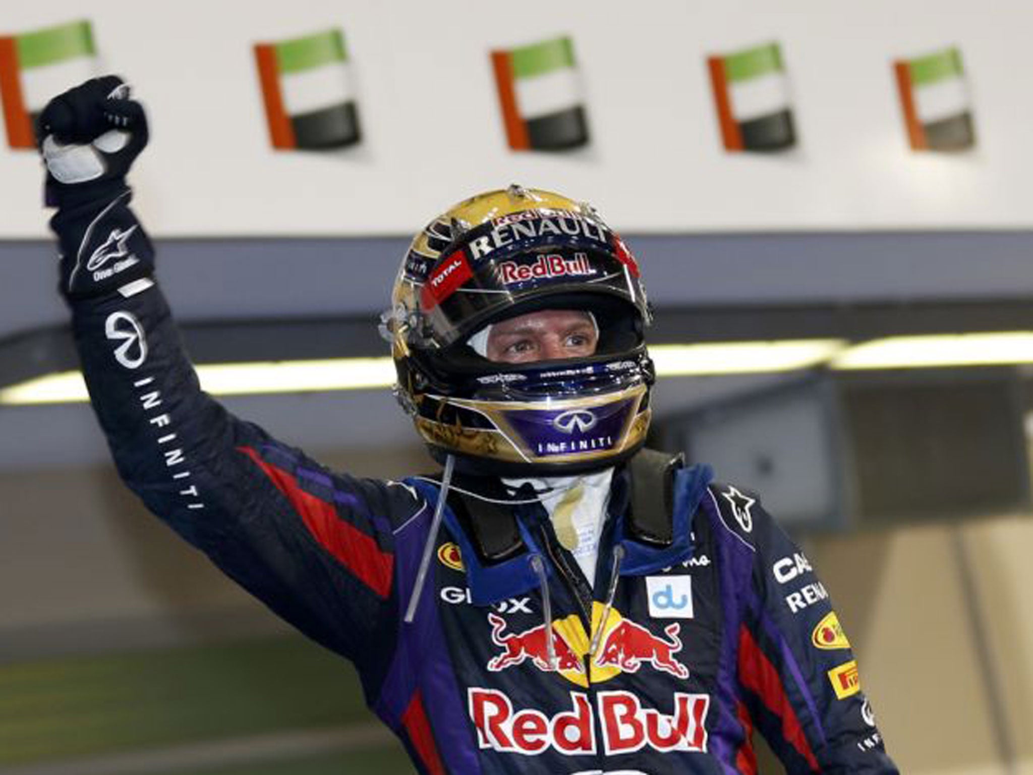 Red Bull Formula One driver Sebastian Vettel of Germany celebrates after winning the Abu Dhabi Grand Prix