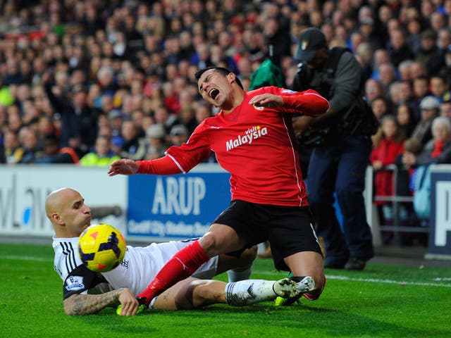 Jonjo Shelvey brings down Gary Medel