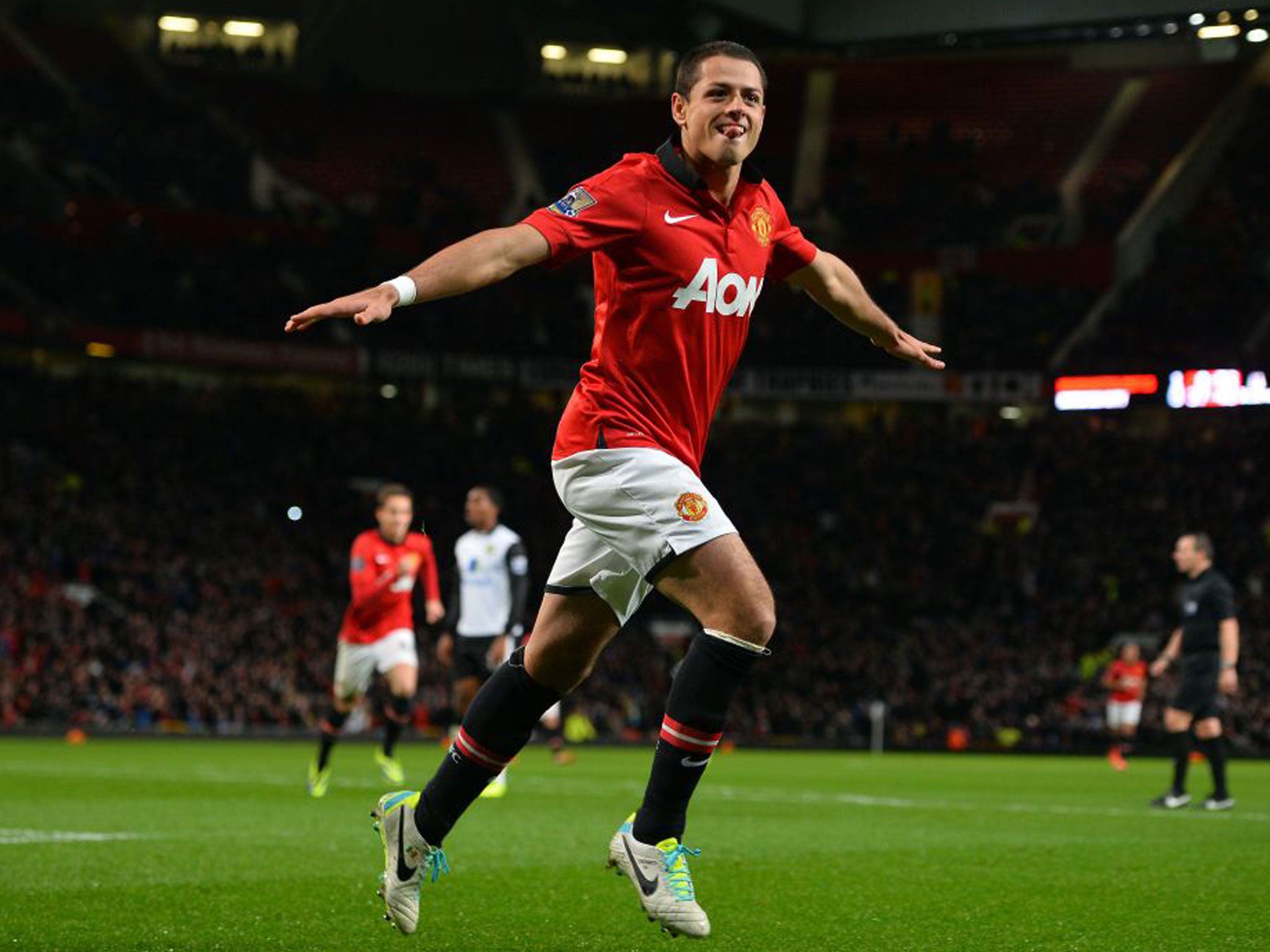 Javier Hernandez celebrates scoring his second goal during the League Cup fourth round match between Manchester United and Norwich City