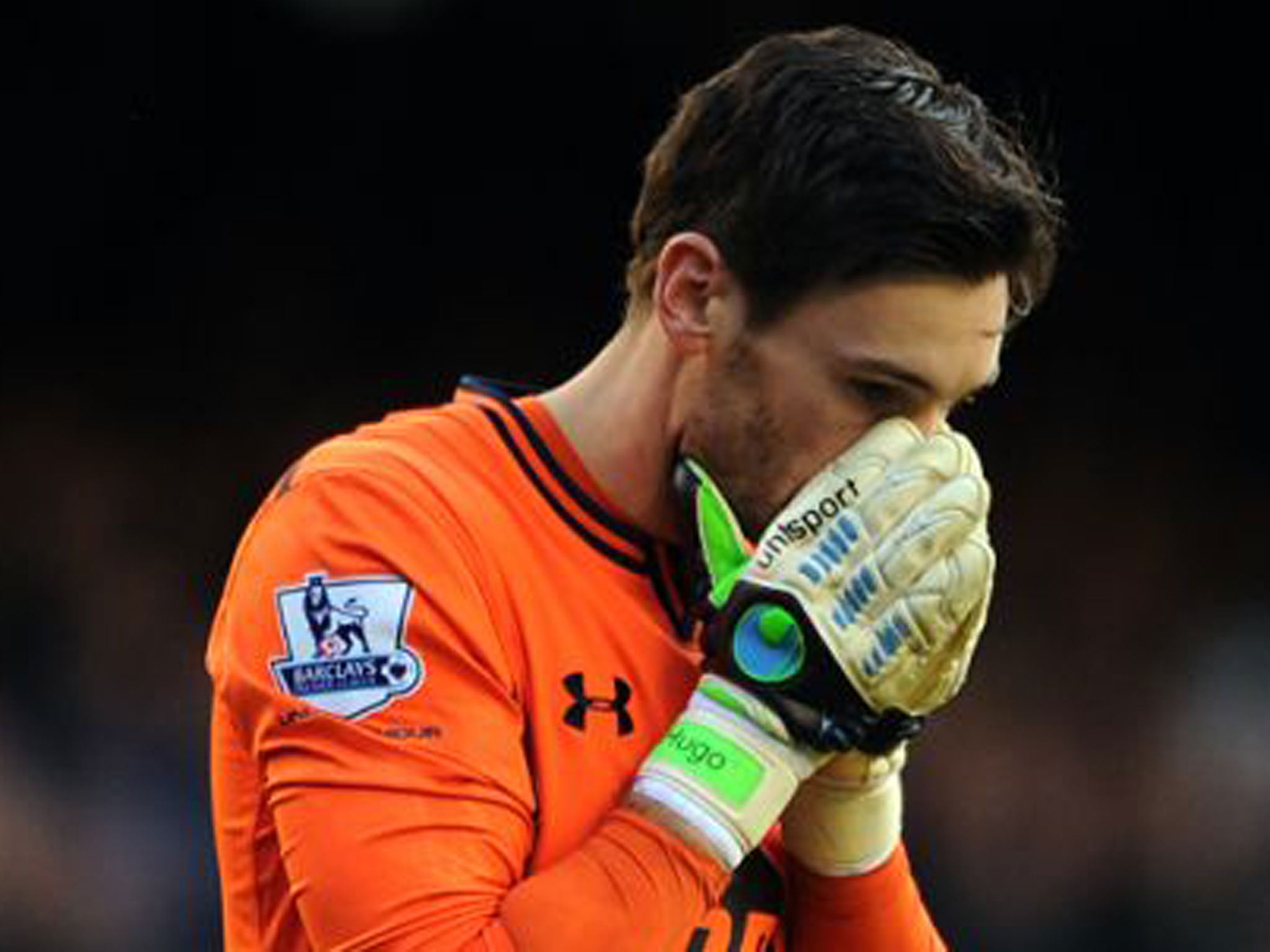 Hugo Lloris stays on the field during Tottenham's draw with Everton despite being having earlier lost consciousness