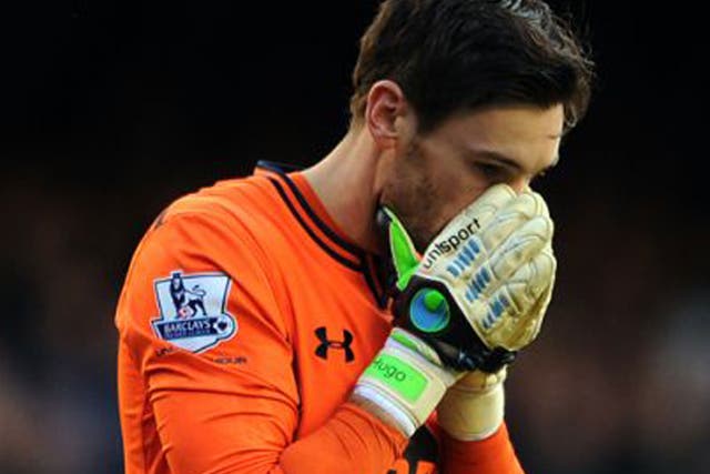 Hugo Lloris stays on the field during Tottenham's draw with Everton despite being having earlier lost consciousness 