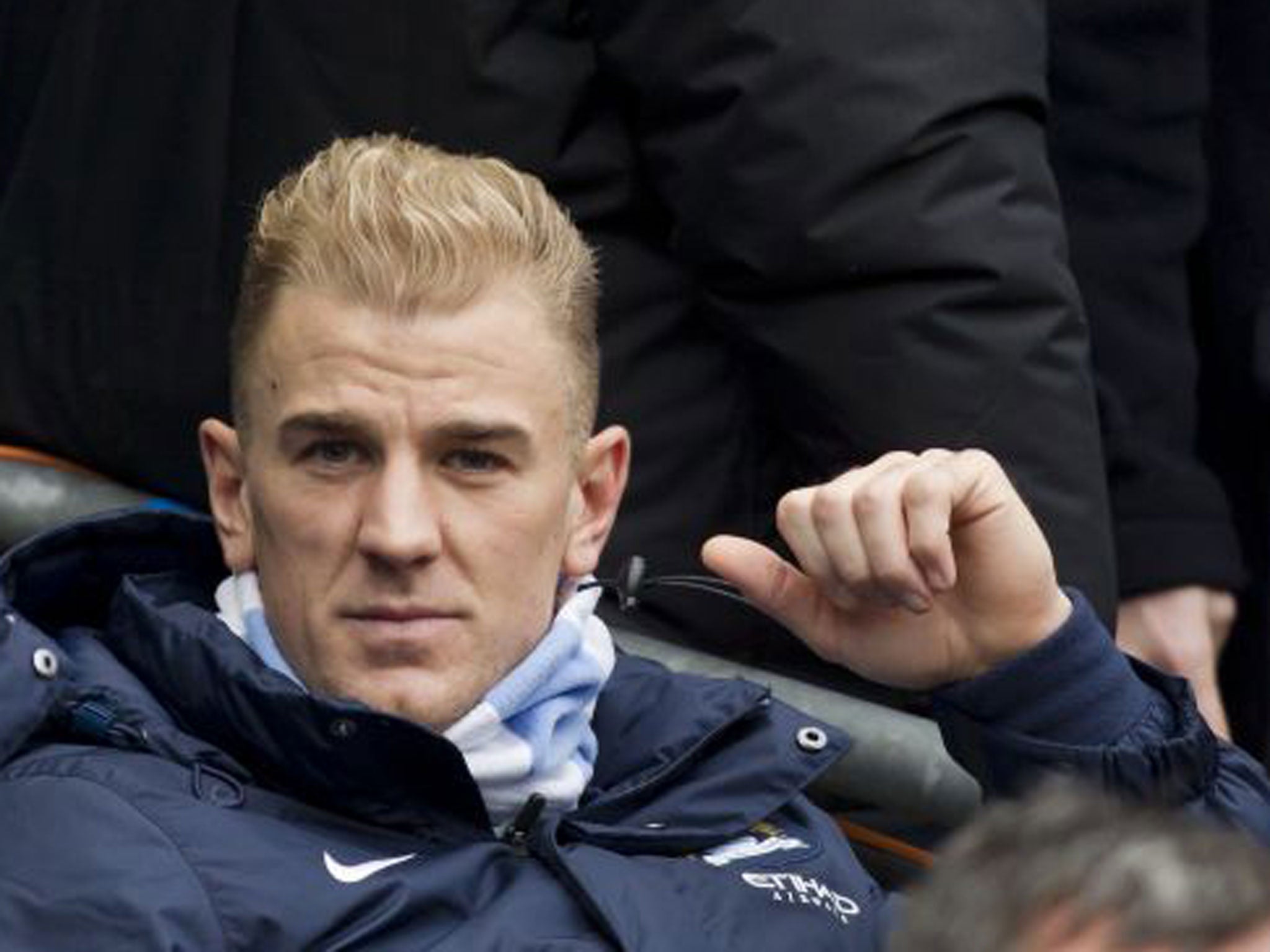 Joe Hart puts on a brave face about sitting on the bench on Saturday after being dropped by Manchester City