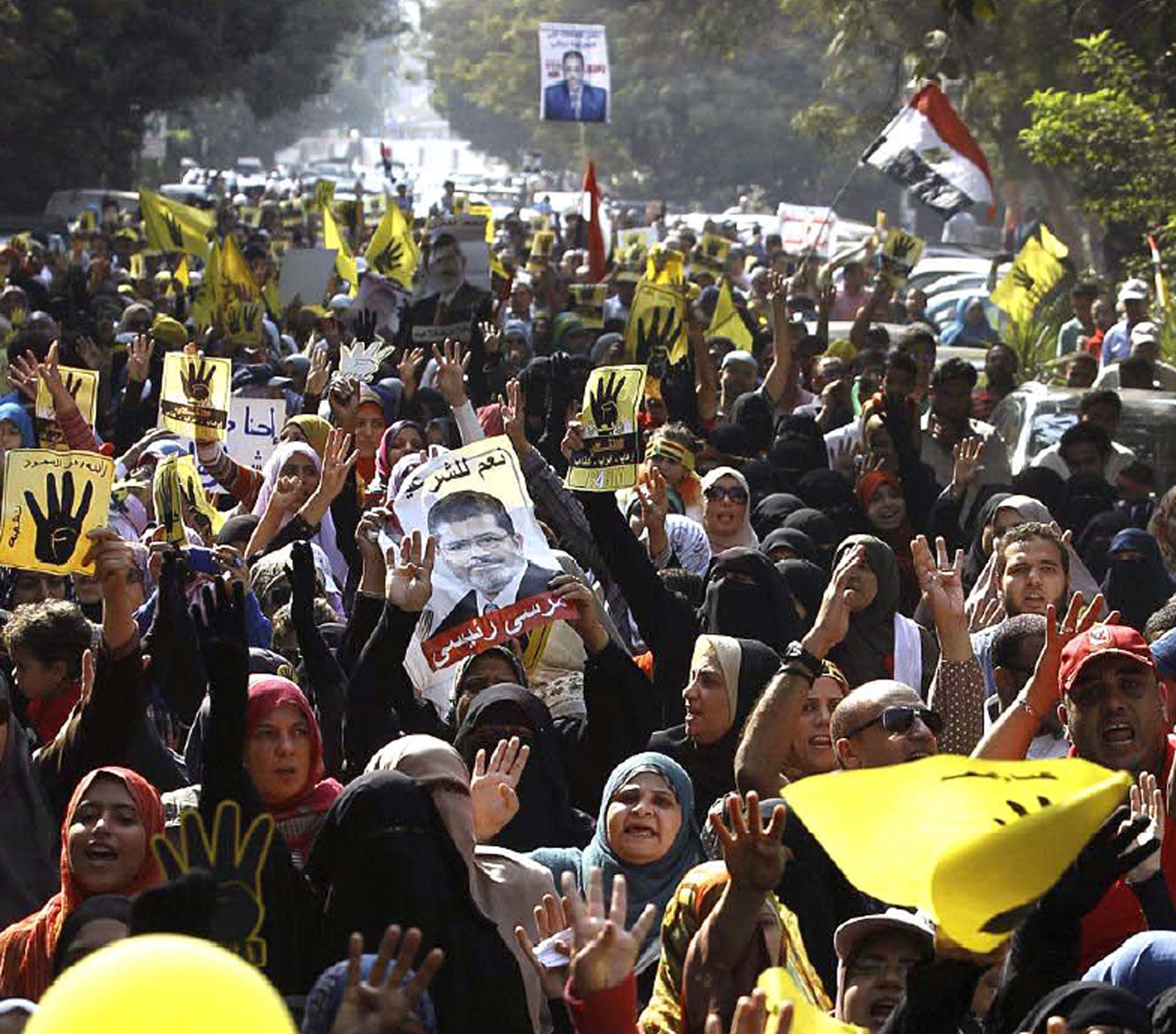 Supporters of Mohamed Morsi, below, are gather expected to gather today in protest