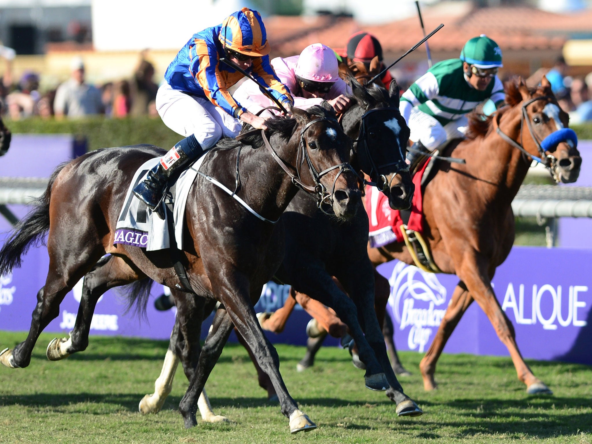 Magician, left, catches The Fugue in the Breeders’ Cup Turf