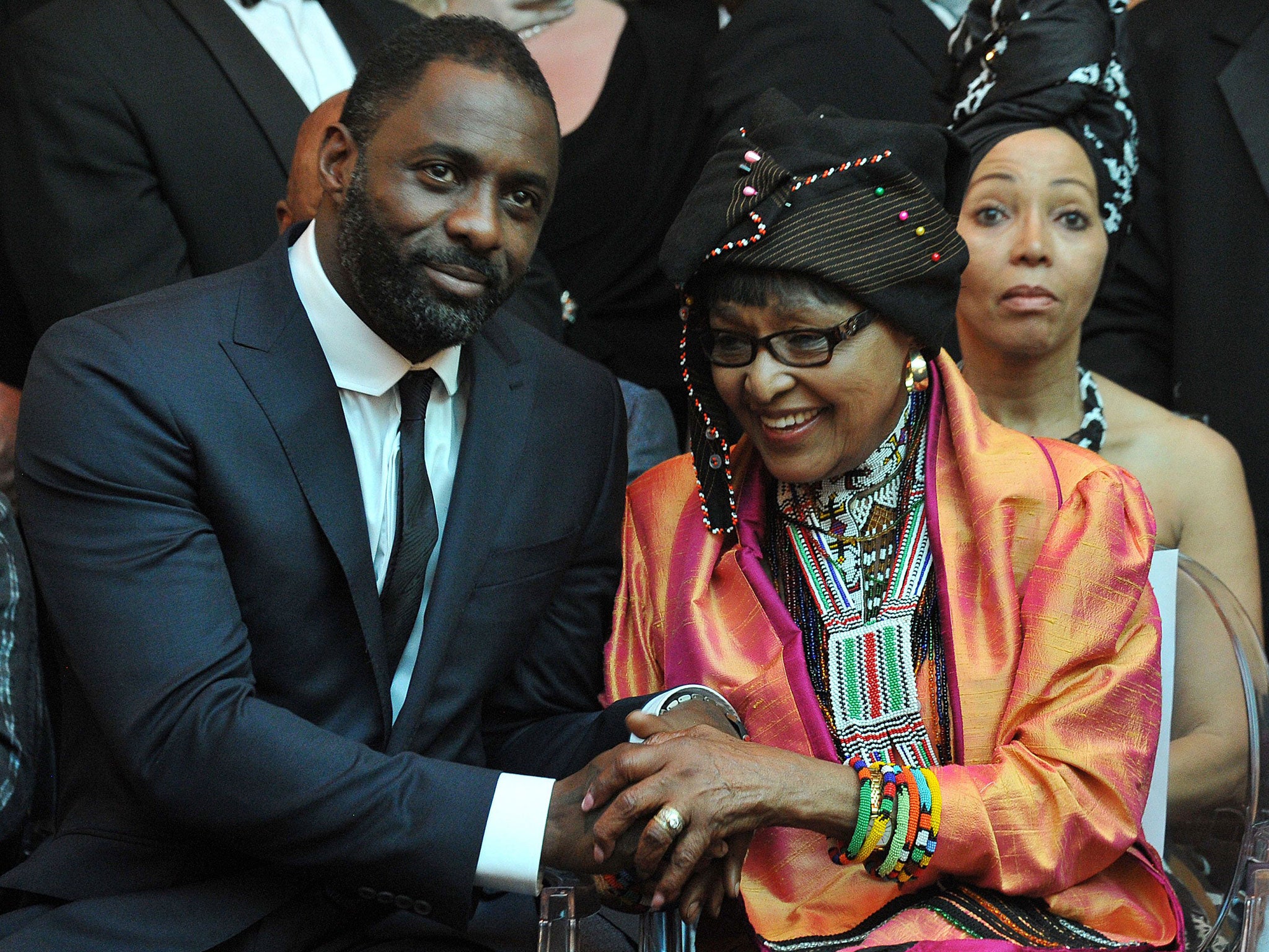 Nelson Mandela’s second wife, Winnie Madikizela-Mandela, right, and British actor Idris Elba, left, who plays the anti-apartheid icon in 'Mandela: Long Walk To Freedom', attend the film’s premiere in Johannesburg