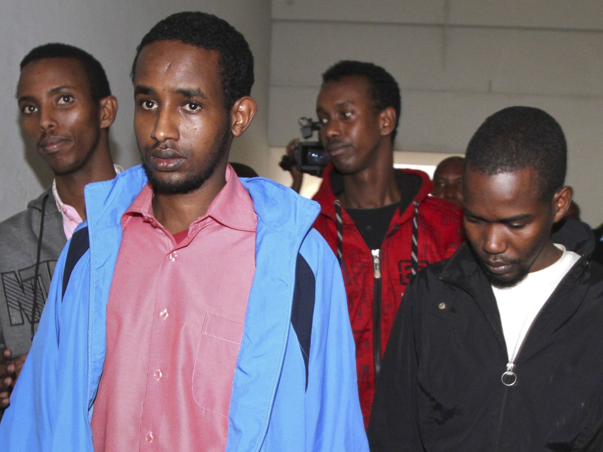 From left to right: Adan Mohamed Ibrahim (alias Adan Abdikadir Adan), Mohamed Abdi Ahmed, Hussein Hassan and Liban Abdullah Omar appear for a hearing at a courtroom in Nairobi