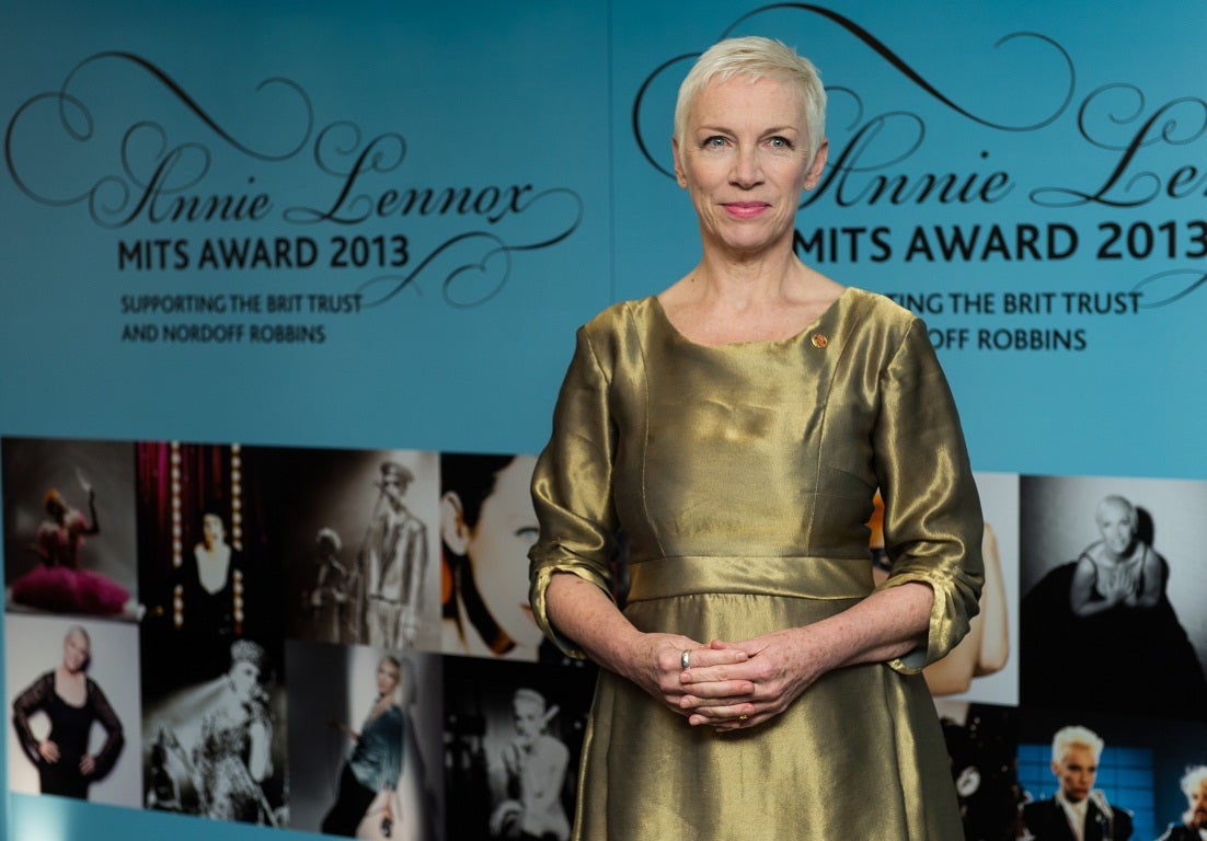 Decked in gold, Annie Lennox accepted her award in London last night