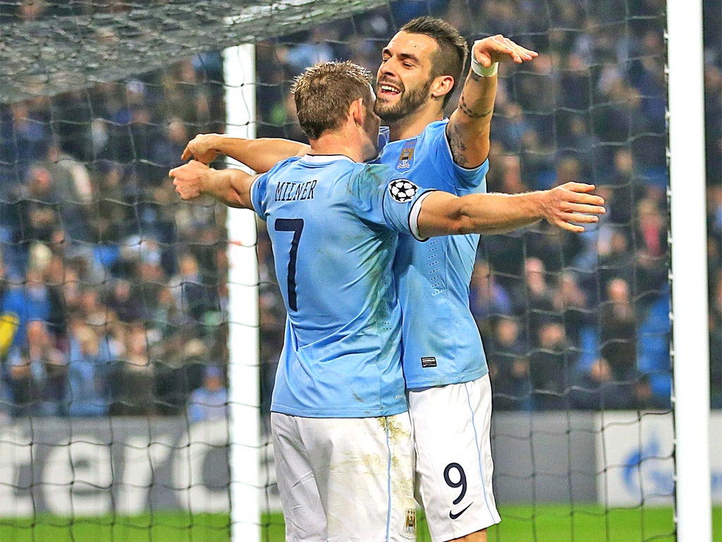 James Milner congratulates Alvaro Negredo on his hat-trick