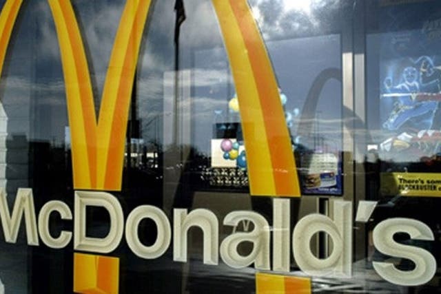 A woman has been arrested after she drove over her boyfriend three times because he refused to take her to McDonald's.