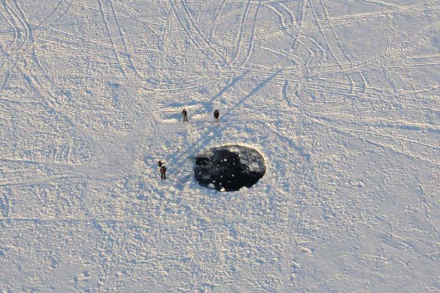 The impact site of the main mass of the Chelyabinsk meteorite in the ice of Lake Chebarkul