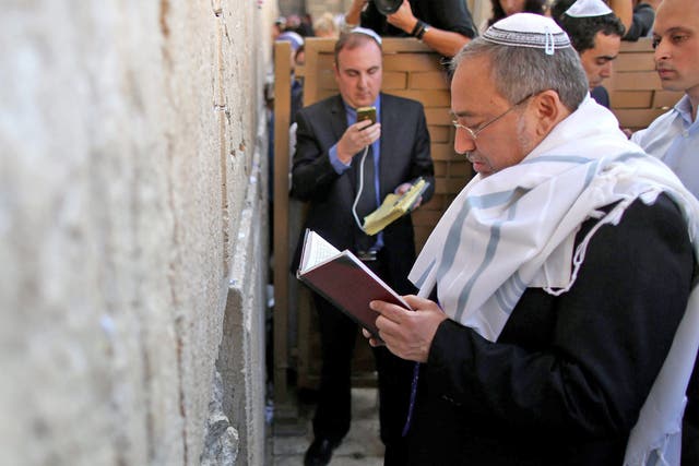 Avigdor Lieberman at the Western Wall in Jerusalem after being acquitted of fraud and breach of trust charges