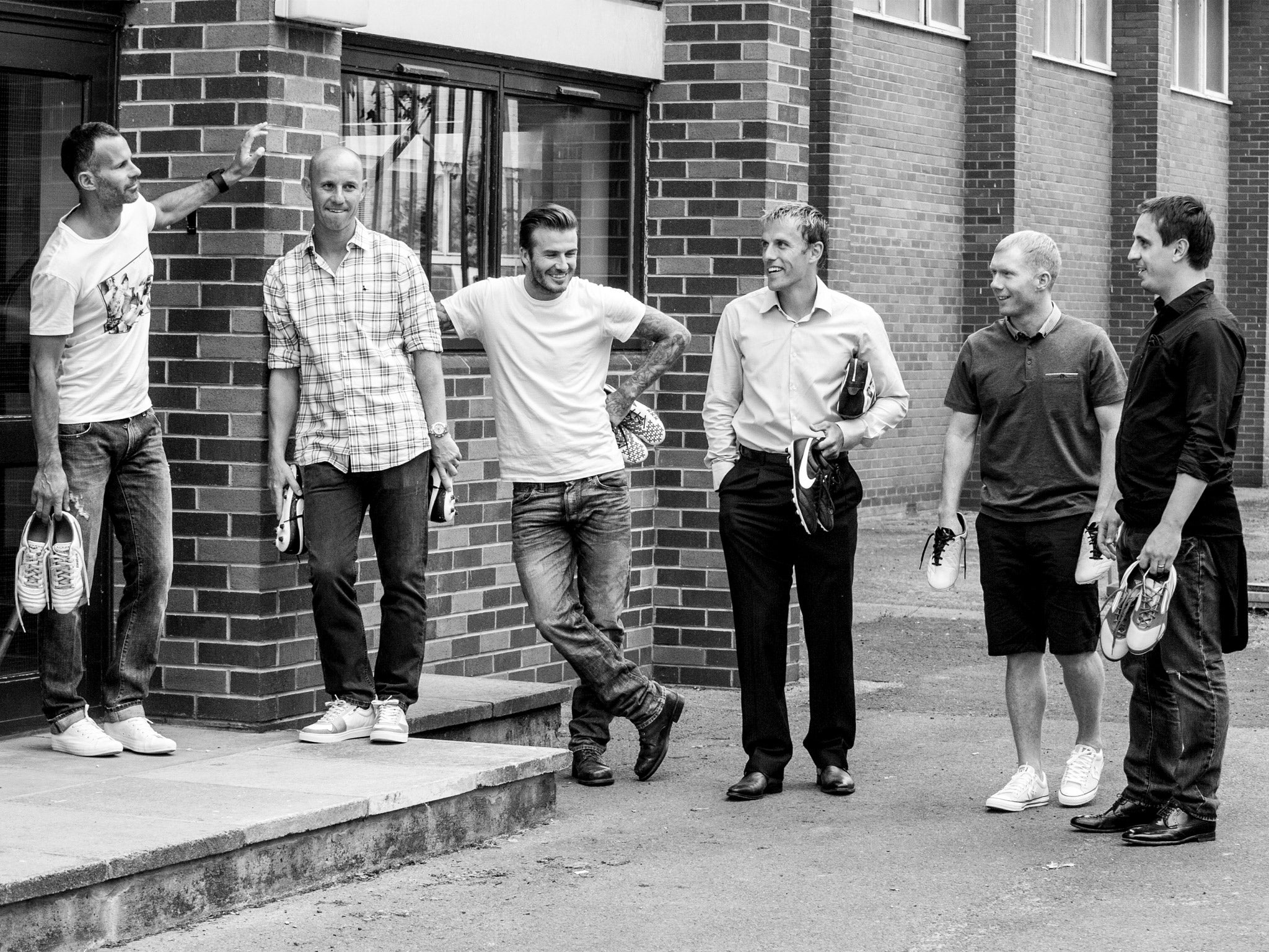  A black and white image of the Class of 92 Manchester United players: Nicky Butt, David Beckham, Ryan Giggs, Paul Scholes, and Gary Neville.