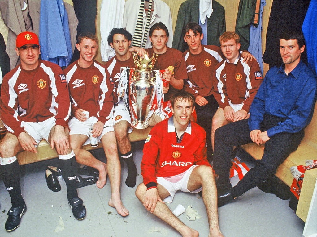 United’s ‘kids’ along with Eric Cantona and Roy Keane show off the Premiership trophy in 1997 (Getty)