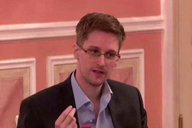 A frame grab reportedly taken on October 9, 2013, shows US intelligence leaker Edward Snowden speaking during his dinner with a group of four retired US ex-intelligence workers