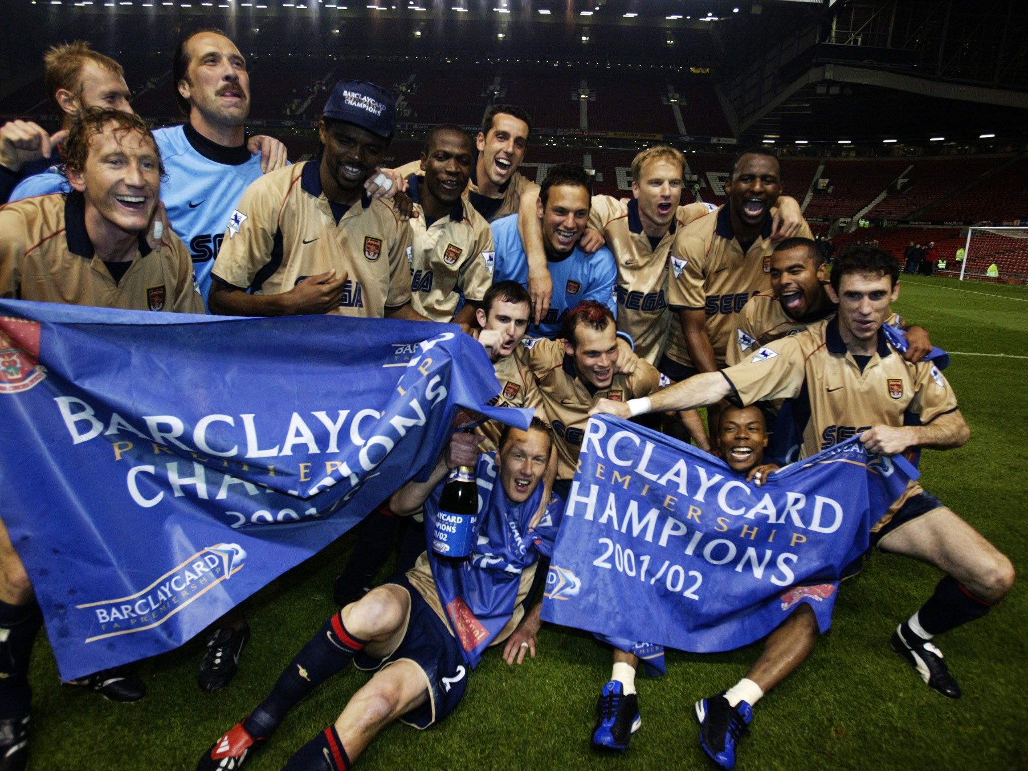 Arsenal celebrate their title triumph at Old Trafford in May 2002 - but can you spot the goalscorer Sylvain Wiltord?