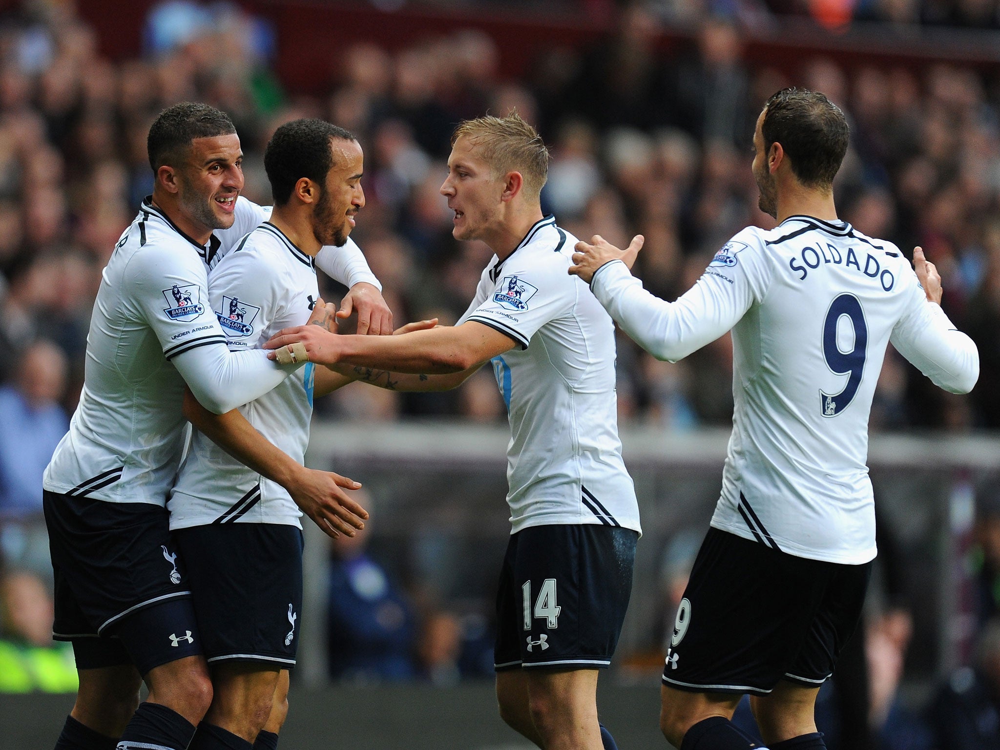 Andros Townsend celebrates with Tottenham team-mates Kyle Walker, Lewis Holtby and Roberto Soldado