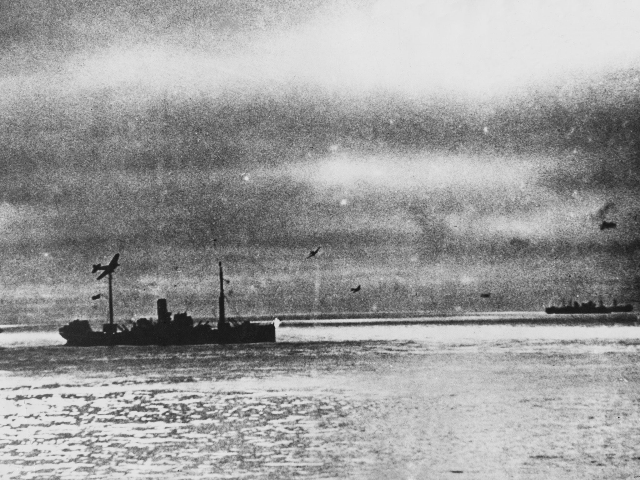 Allied World War II convoy PQ 17 is attacked by German torpedo aircraft on its way across the Arctic Ocean from Hvalfjord in Iceland to Arkhangelsk in the Soviet Union, in July 1942