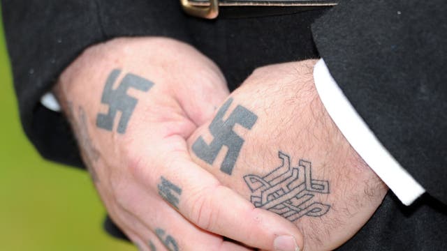 Scottish tattoo parlours to offer free swastika inkings in bid to 'reclaim'  symbol | The Independent | The Independent
