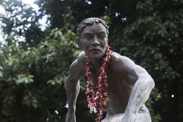 A statue of surfing legend Eddie Aikau, Honolulu