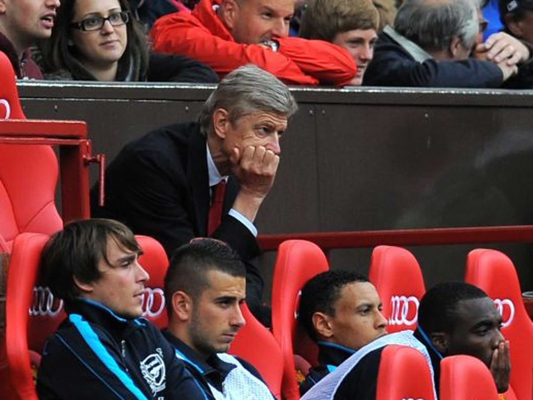 Score to settle: Wenger sees his team taken apart at Old Trafford in 2011 but returns today in a position of strength