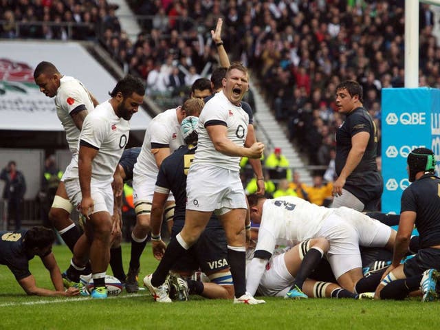 Take that: Dylan Hartley celebrates as Joe Launchbury claims the first of England’s four tries