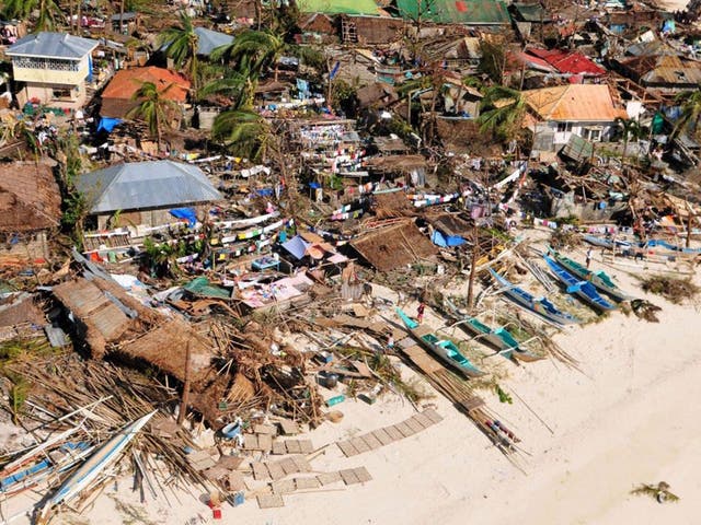 Devastation: The scene in Tacloban in central Philippines after it was hit by Haiyan
