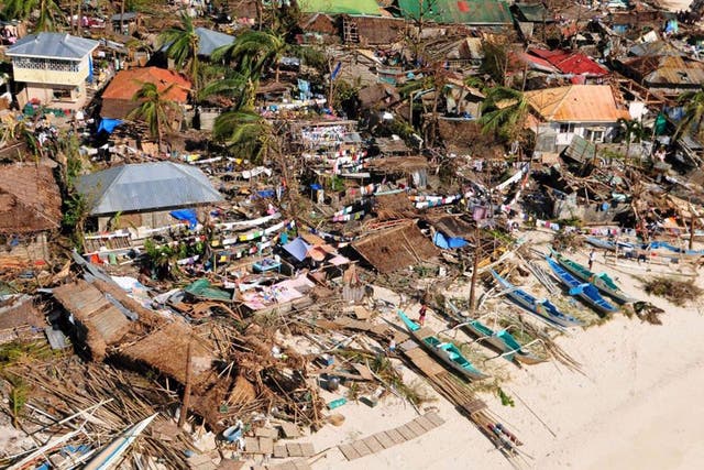 Devastation: The scene in Tacloban in central Philippines after it was hit by Haiyan