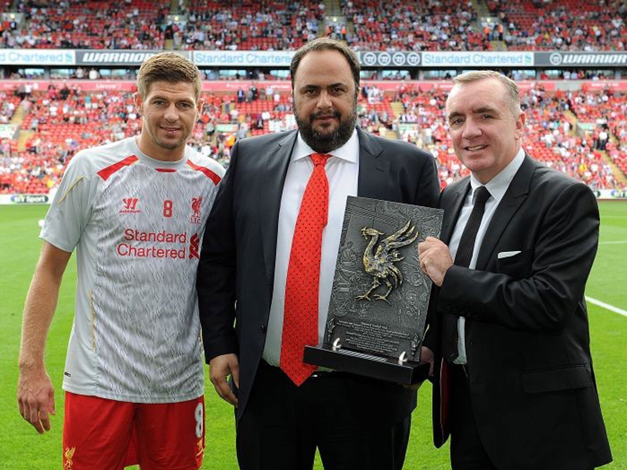 Evangelos Marinakis with managing director Ian Ayre and Steven Gerrad