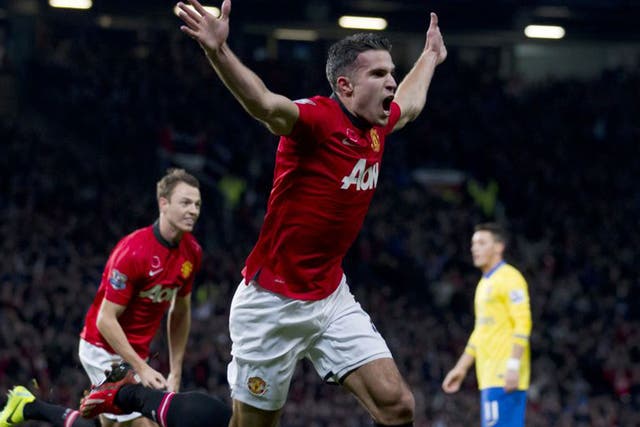 Robin van Persie celebrates the only goal of the game against his former team