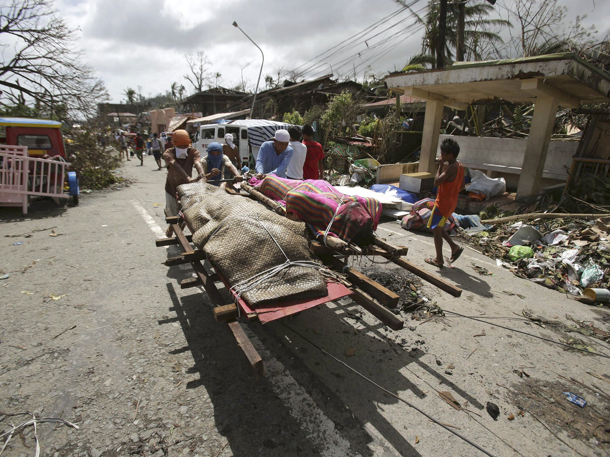 Bodies are taken out of Tacloban