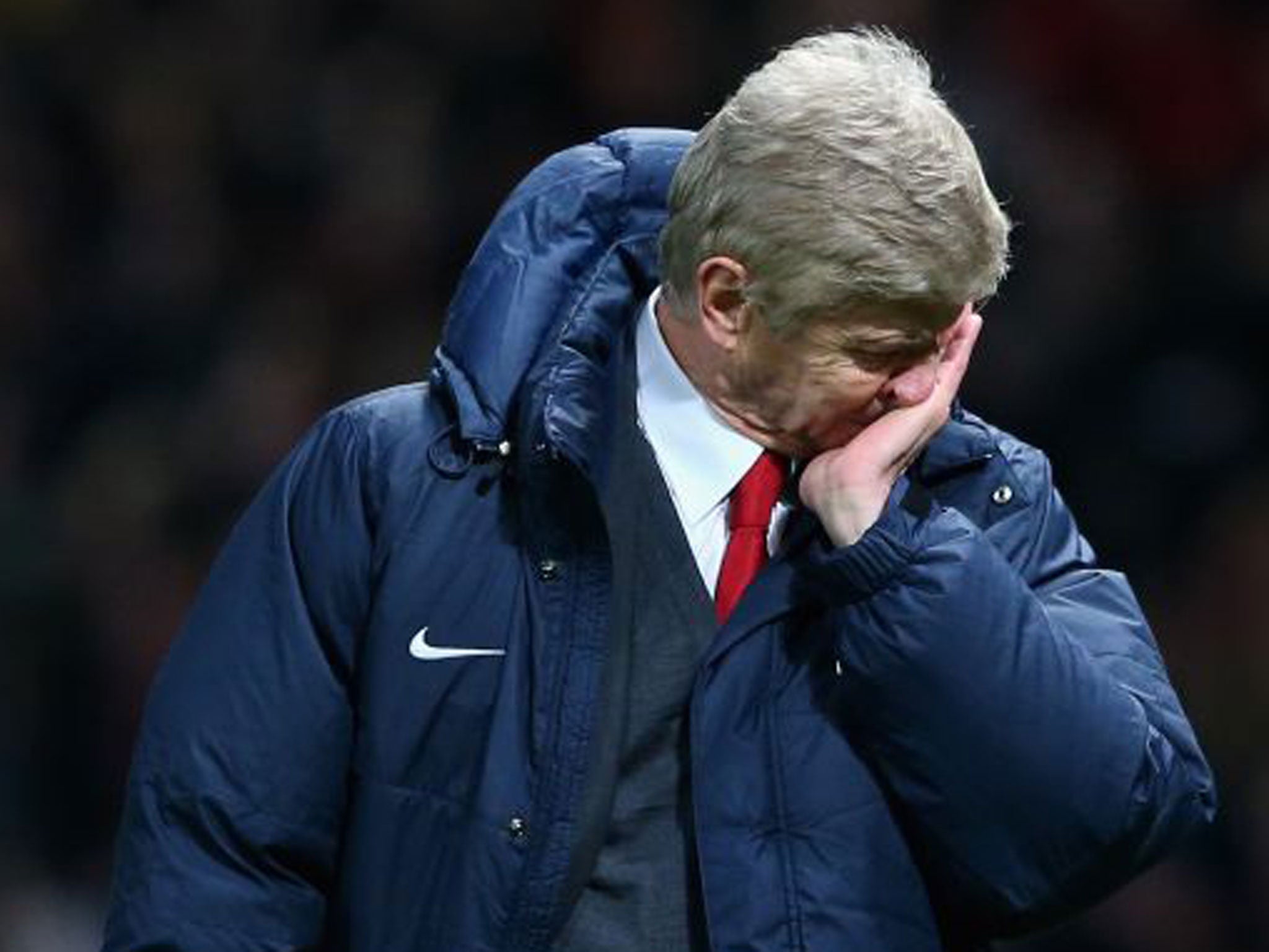 Arsenal Manager Arsene Wenger shows his dejection at the end of the match