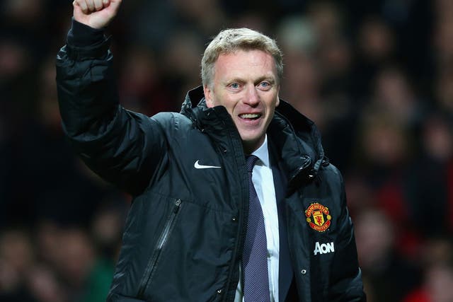 Manchester United manager David Moyes celebrates victory over Arsenal