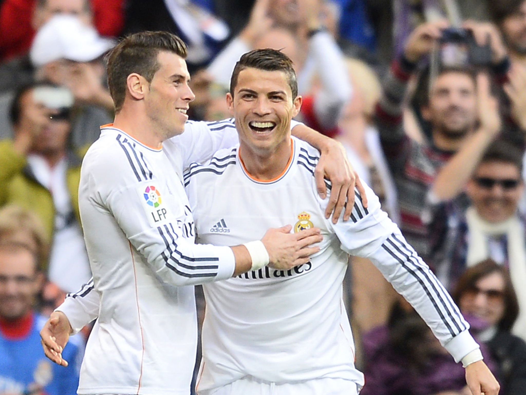 Cristiano Ronaldo (right) celebrates his first goal in the 5-1 win over Real Sociedad with Gareth Bale on Saturday