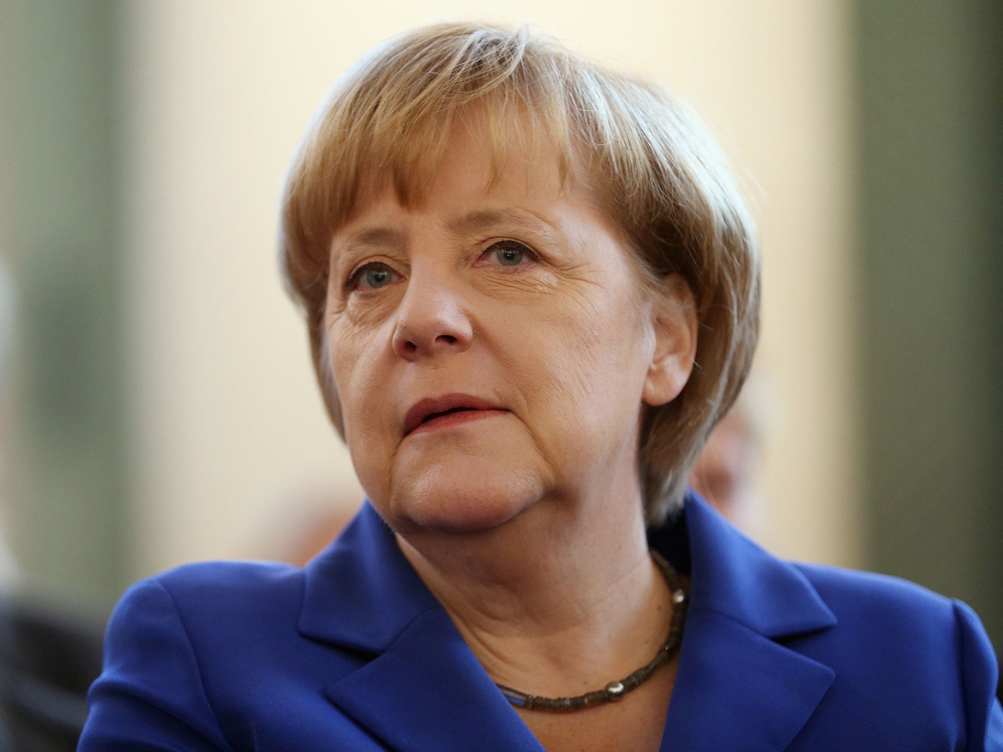 Angela Merkel has promised progress on identifying Munich art haul