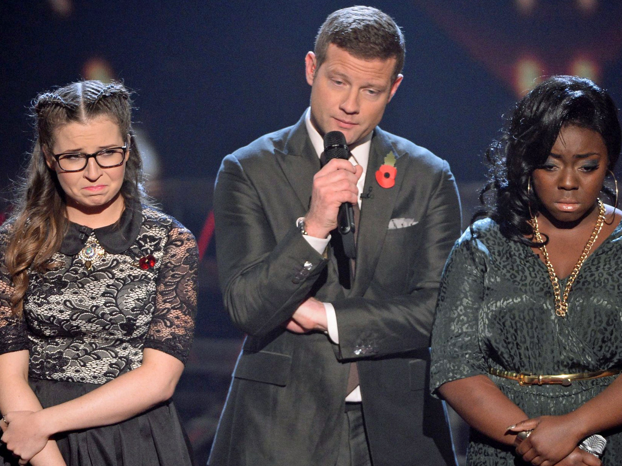 Dermot O'Leary with Hannah Barrett and Abi Alton, who was voted off 'The X Factor'
