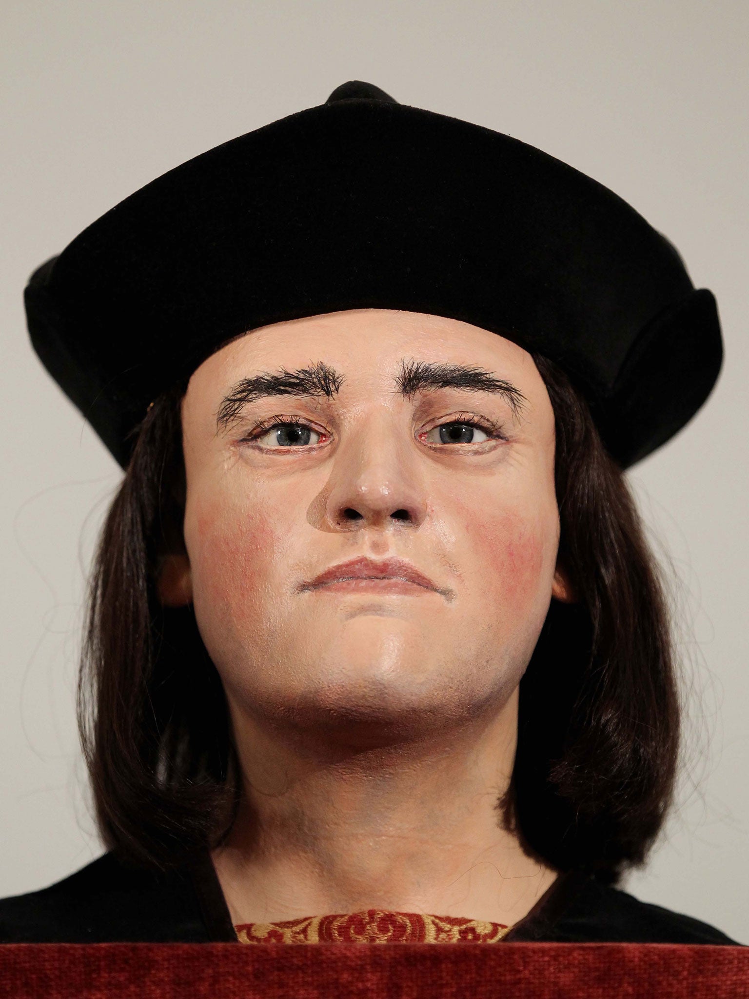 A model of the face of King Richard III - his reinterment looks set to be delayed after a key decision over the construction of his tomb was put off